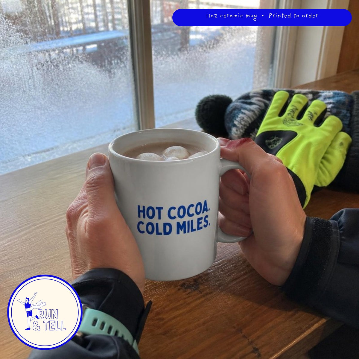 Cold hands holding the Hot Cocoa. Cold Miles. mug after a winter run