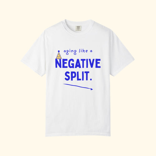 Aging Like a Negative Split white runner birthday t-shirt on a cream background