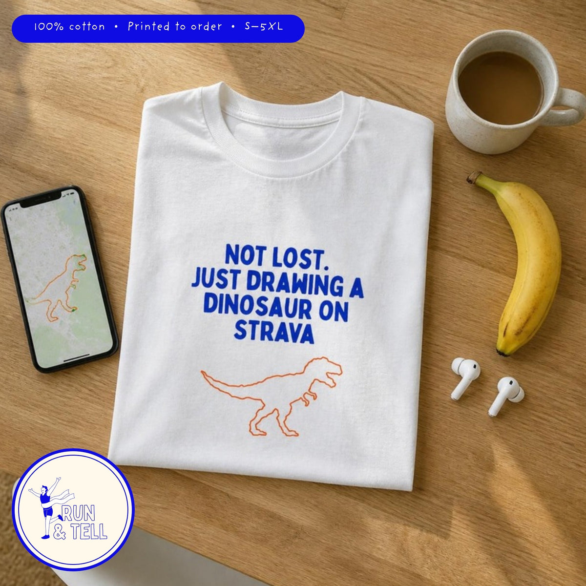 Flat lay of the Not Lost. Just Drawing a Dinosaur on Strava funny running shirt by Run & Tell