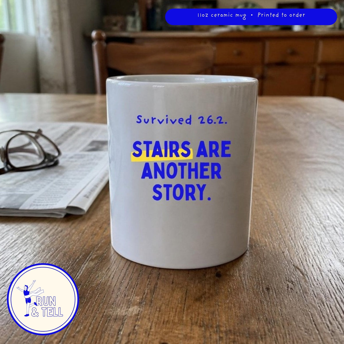 Survived 26.2 stairs mug on a kitchen table