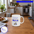 I Ran Philly 26.2, Ask Me About Mile 20 mug, kitchen table