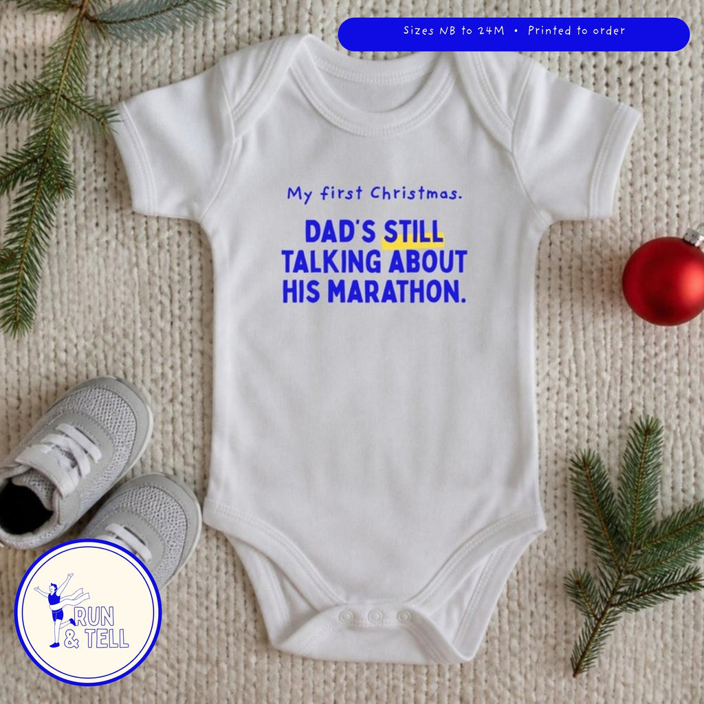 Dad's still talking about his marathon baby bodysuit with tiny shoes