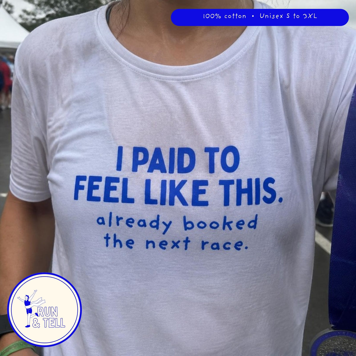 Close-up of the I Paid to Feel Like This running t-shirt print after a race